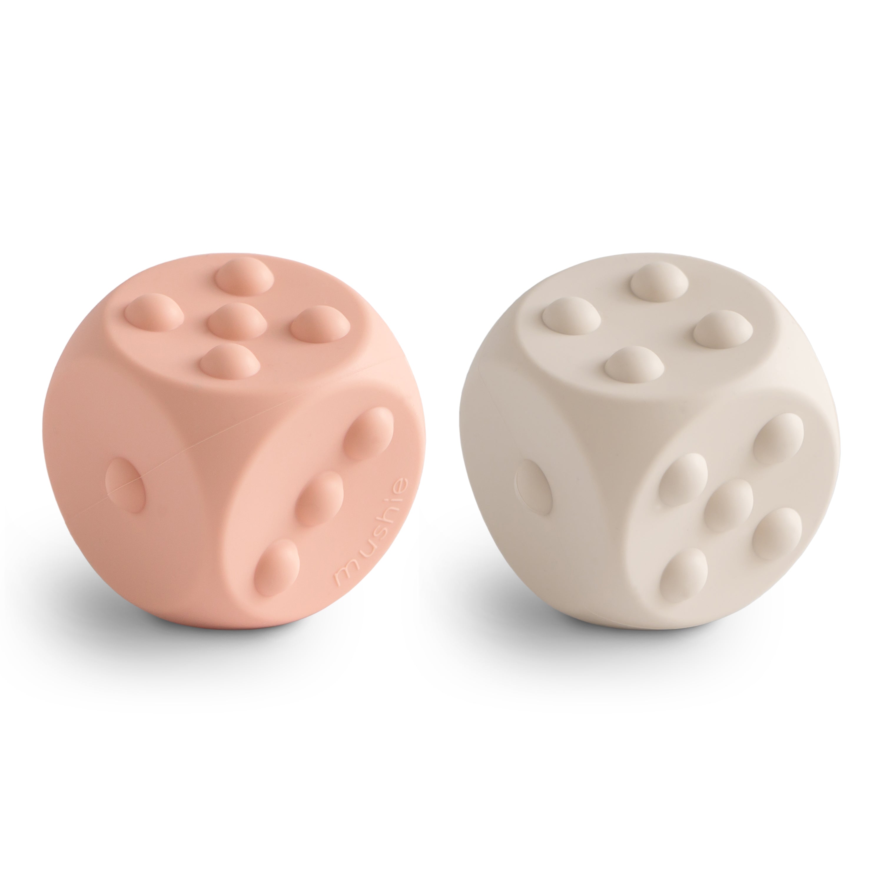 Mushie spaudžiamas žaislas „Dice Press Toy“, 2 vnt. – Blush/Shifting Sands