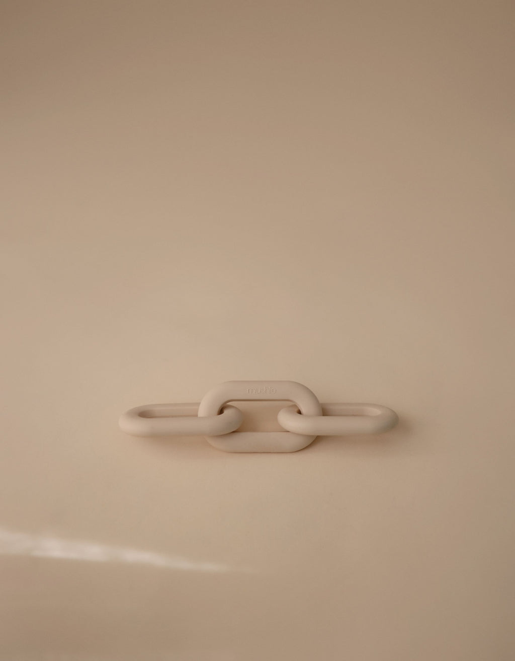 Mushie grandinėlių kramtukas „Links Teether“ – Shifting Sand