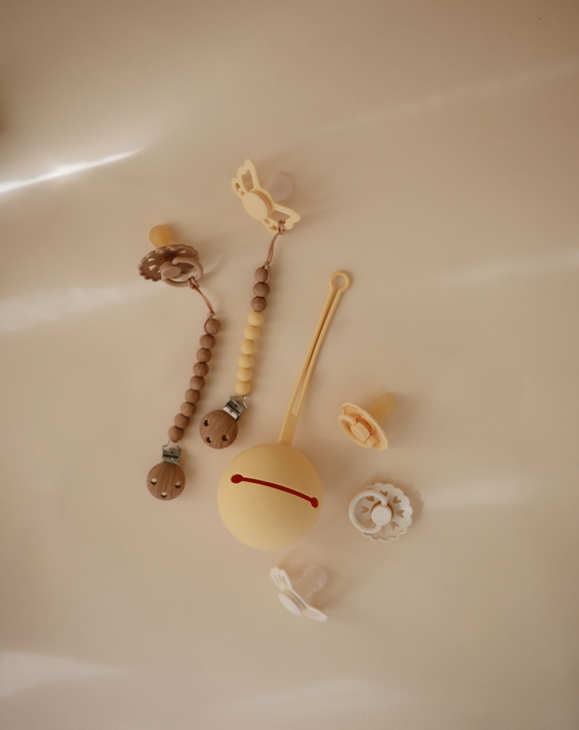 Čiulptukų silikoninis dėklas - Švelni geltona